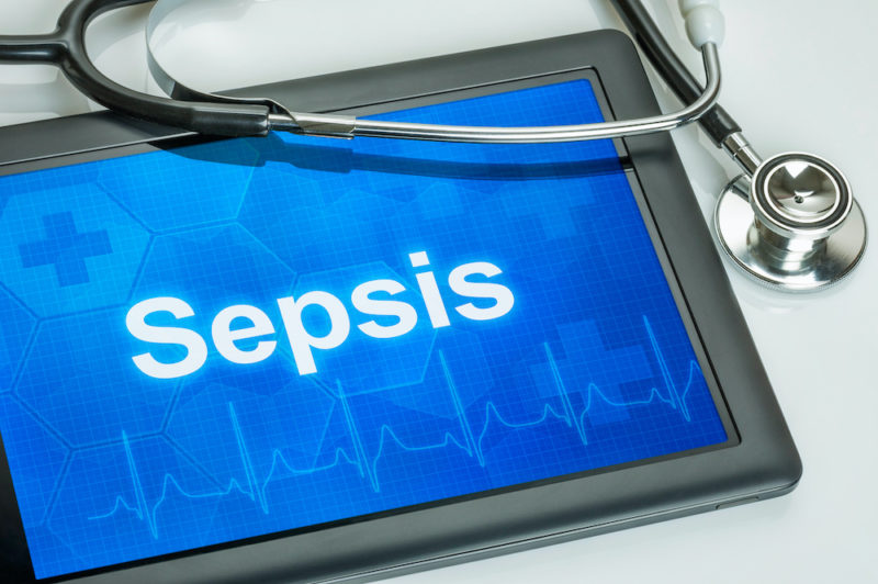 Tablet mit der Diagnose Sepsis auf dem Display